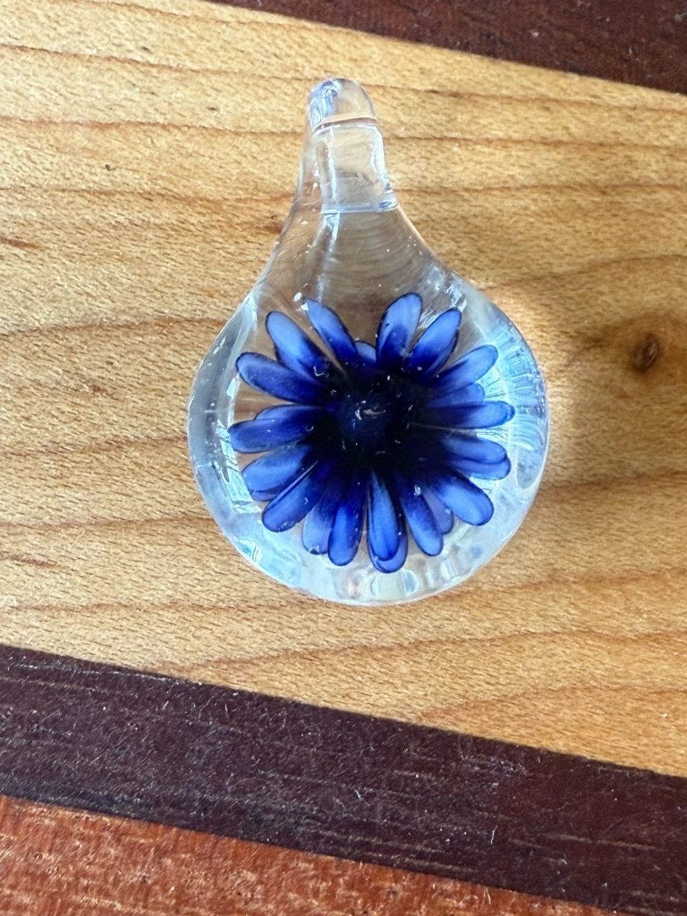 Handblown Clear Glass Pendant with Blue Flower Accent